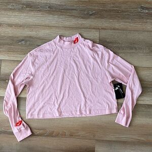 nike women’s pastel pink medium sportswear long sleeve cropped tshirt